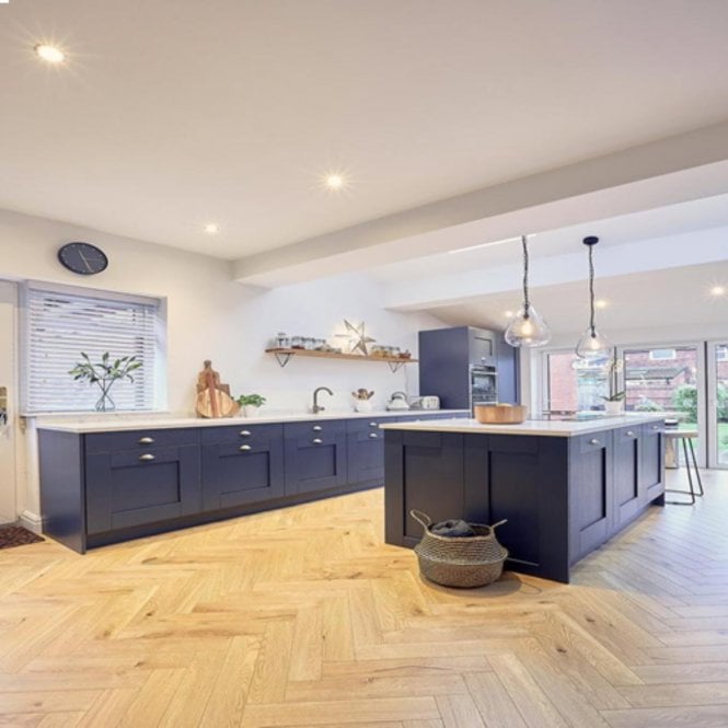 Knot and Grain Kensington Natural Oak Herringbone Parquet Laminate Flooring 12mm AC4 Grade