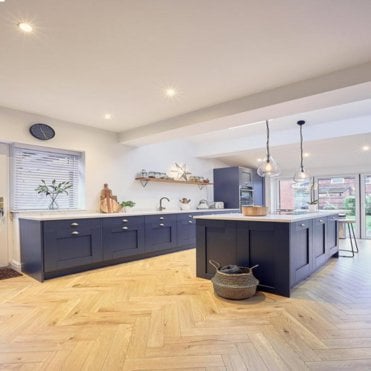 Kensington Natural Oak Herringbone Parquet Laminate Flooring 12mm AC4 Grade