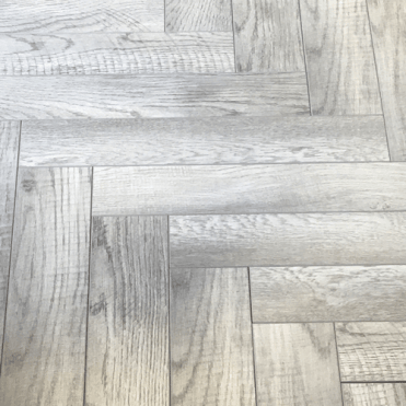 Westminster Grey Oak Herringbone Parquet Laminate Flooring 12mm (AC4 Version)